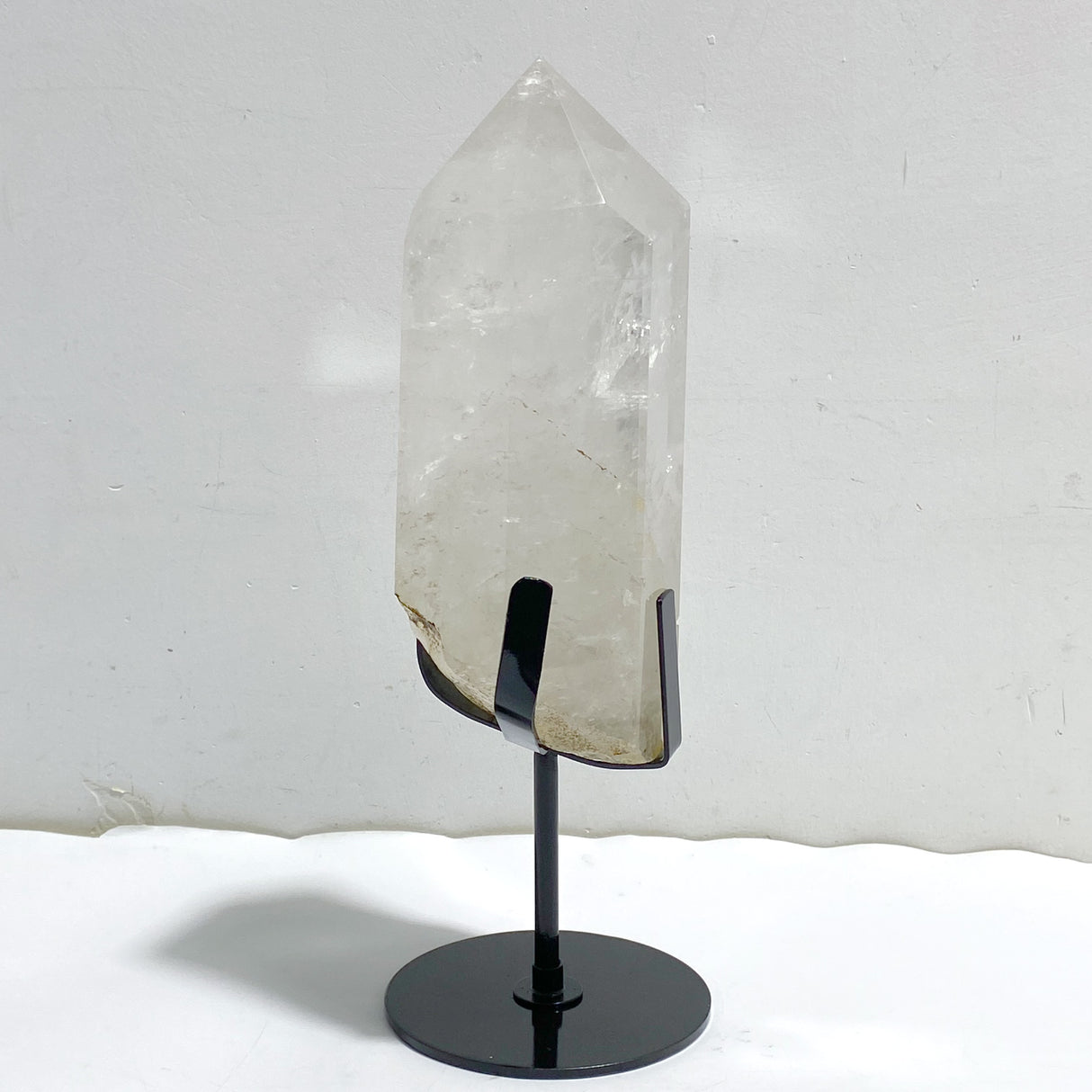 Large Clear Quartz Point Raw Bottom With Stand