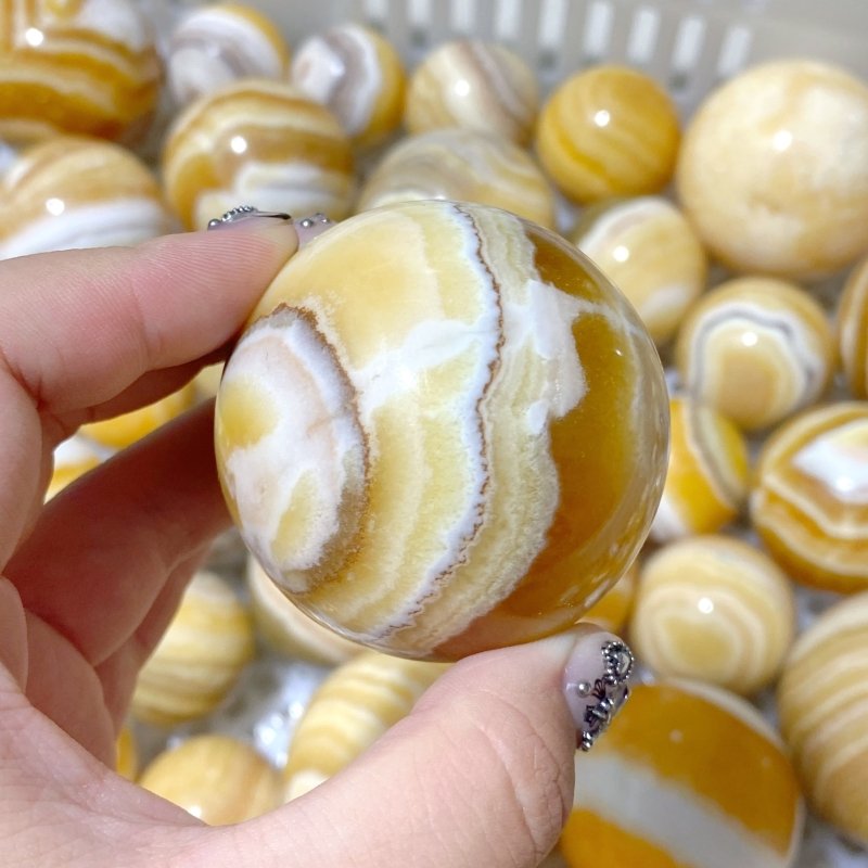 73 Pieces Stripe Yellow Calcite Spheres (Sea Freight Only) -Wholesale Crystals