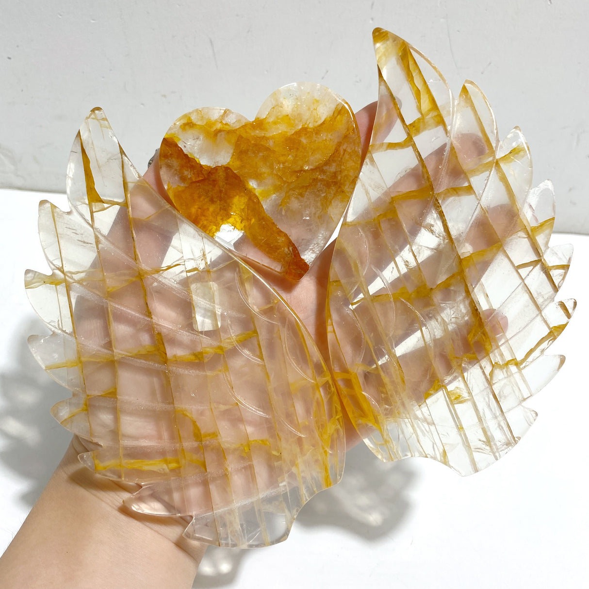 Golden Hematoid Quartz Heart Wing Carving With Stand Fire Quartz