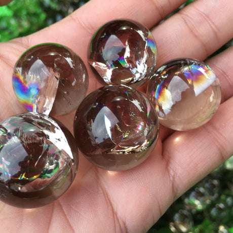 small smoking quartz spheres with rainbow -Wholesale Crystals