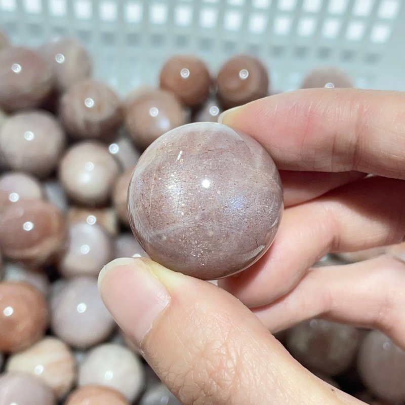 0.8 - 1.1in Beautiful Spark Sunstone Spheres Wholesale - Wholesale Crystals