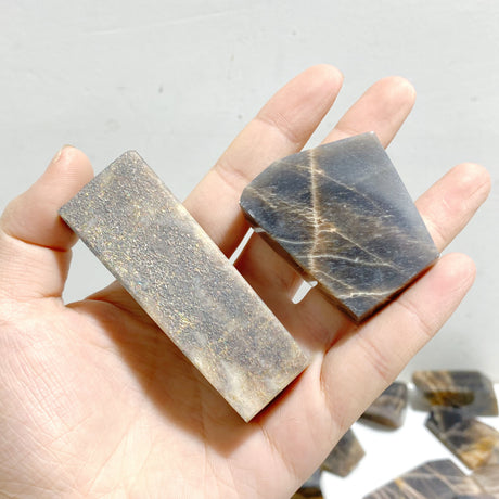 65 Pieces Black Rainbow Sun Stone With Hematite Free Form