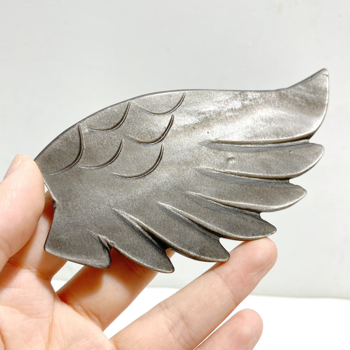 Silver Sheen Obsidian Heart Wing Carving With Stand