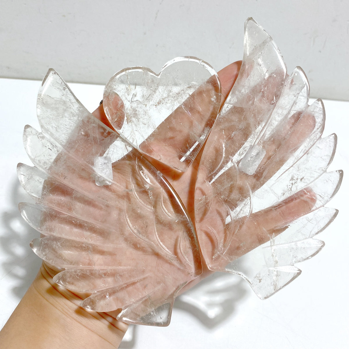 Clear Quartz Heart Wing Carving With Stand