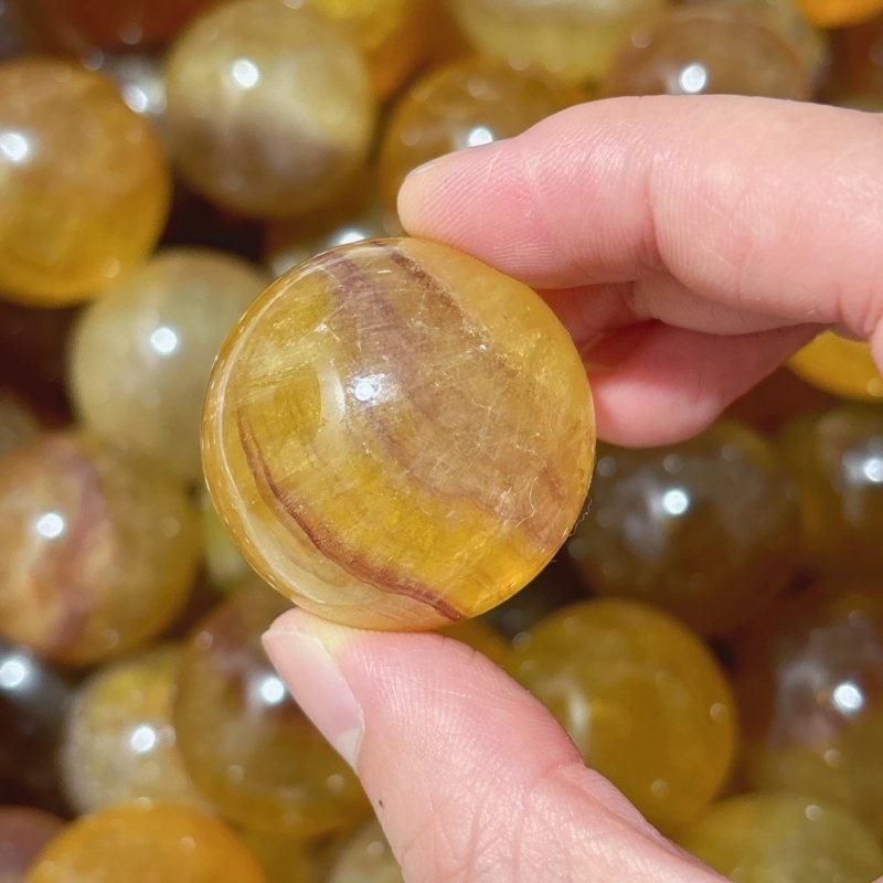 Cute Small Yellow Fluorite Spheres Wholesale - Wholesale Crystals