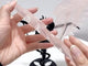 Rose Quartz Demon And Angel Wing Carving With Stand
