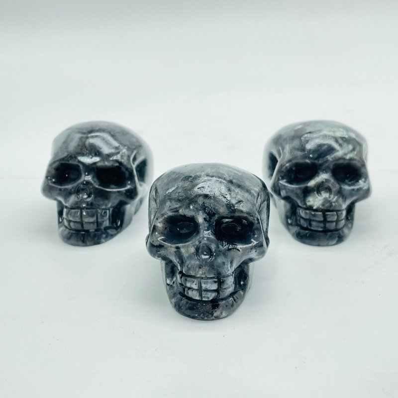 1.7in Skull Carving Wholesale Yooperlite (UV Reactive) Larvikite -Wholesale Crystals