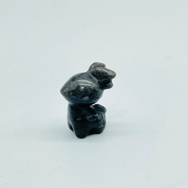 https://crystalswholesaleusa.com/cdn/shop/products/8-types-mini-black-obsidian-christmas-carving-wholesale-apple-santa-claus-penguin-878965.jpg?v=1701791023