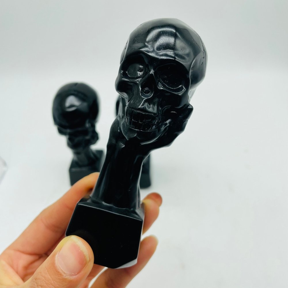 Black Obsidian Hand Holding Skull Carving Wholesale -Wholesale Crystals