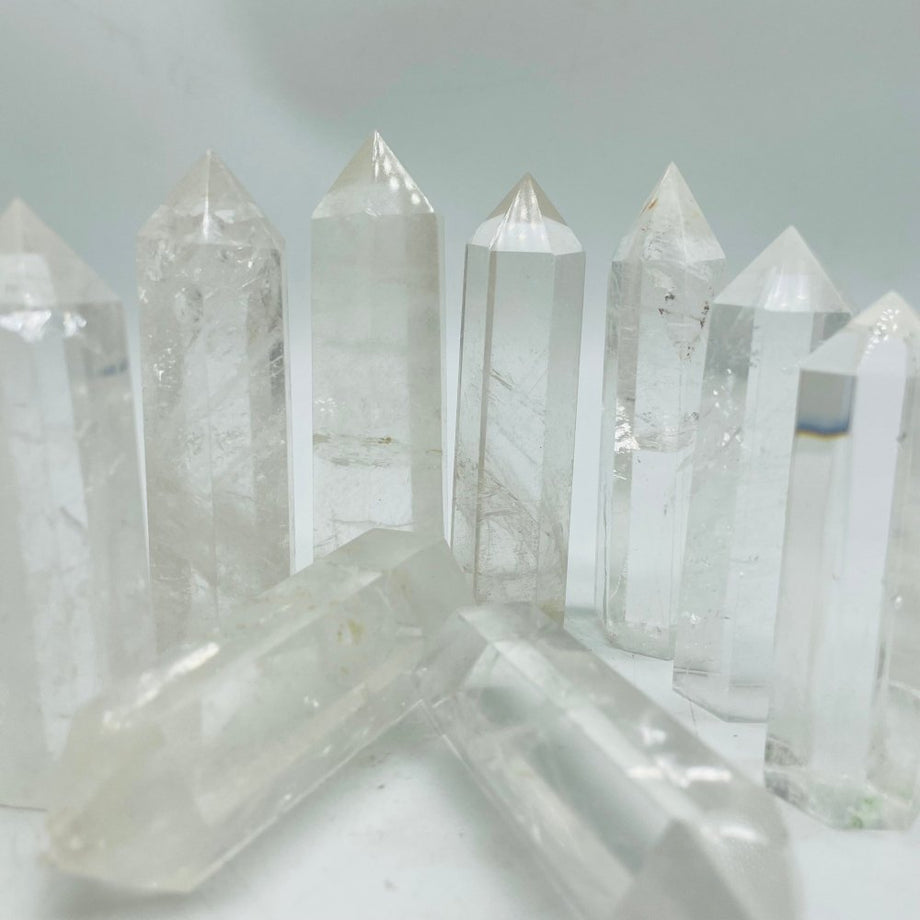 https://crystalswholesaleusa.com/cdn/shop/products/clear-quartz-white-crystal-point-tower-wholesale-wholesale-crystals-367105_460x@2x.jpg?v=1653329672